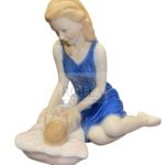 Figurine mamma con bimbo sul cuscino
