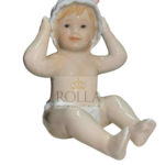 Figurine - Neonata con cuffietta