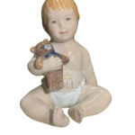 Figurine - Neonato con orsetto