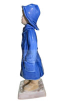 Figurine - Bimbo con impermeabile - immagine 4