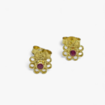 Orecchini a fiore con strass rosso
