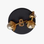 Orecchini a fiore con perla - immagine 3